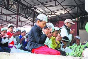 Muslim devotees offer prayers on Eid-ul-Azha in Mussoorie on Monday