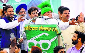INLD supremo Om Prakash Chautala addresses a rally in Karnal on Tuesday. Tribune photo: Ravi Kumar