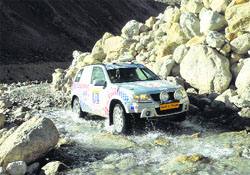A contestant crosses the Chandra river in the Spiti valley on Tuesday. A Tribune photograph