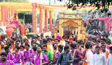 A large number of devotees at the shobha yatra on the occasion of Valmiki Jayanti in Jalandhar on Tuesday.