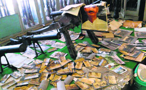 Damaged artefacts and manuscripts at the SPS Museum in Srinagar.