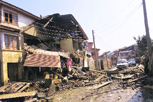 The remains of houses in the posh Raj Bagh area of Srinagar.