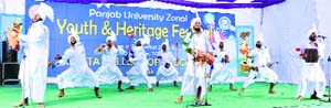 Students perform Malwai giddha at the Bhutta College of Education near Mandi Ahmedgarh on Tuesday