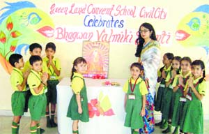 tiny tots pay tributes to Lord Valmiki at Green Land Convent School in Ludhiana. 