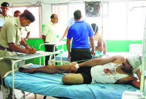 Prisoners injured in the Bhondsi jail fight between two groups at the Civil Hospital in Gurgaon on Tuesday. 
