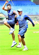 Skipper MS Dhoni and Virat Kohli train on Tuesday.