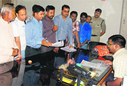 Members of the BJP youth wing interact with District Magistrate Chandresh Yadav regarding problems of potters in Dehradun on Tuesday. A Tribune photograph