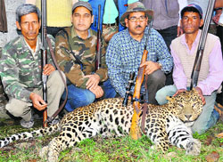 Renowned hunter Lakhpat Singh (second from left) with his team after killing a man-eater leopard in Pithoragarh district on Tuesday. Photo: Sanju Pant
