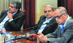 (From R) Infosys founders NR Narayana Murthy, Kris Gopalakrishnan and Nandan Nilekani at a press meet in Bangalore. AFP