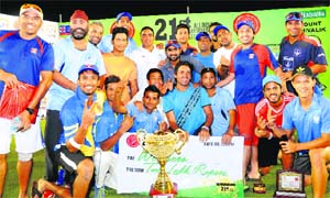 ONGC players in a jubilant mood after winning the 21st All-India JP Atray Memorial Cricket Tournament at the PCA Stadium in Mohali on Wednesday.