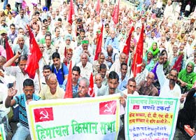 Retrenched workers of the BBMB hold protest in Mandi on Wednesday