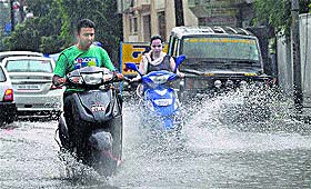 Youngsters drenched in sudden rain in Jalandhar on Wednesday.