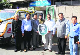 Executive Director, Powergrid, Northern Region-II, SK Sharma presents an ambulance to the Sher-e-Kashmir Institute of Medical Sciences, Soura. 