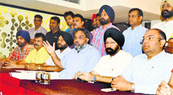 Gurpreet Singh, president of the Association of Computer Entrepreneurs, addresses the media in Ludhiana. Photo: Inderjeet Verma
