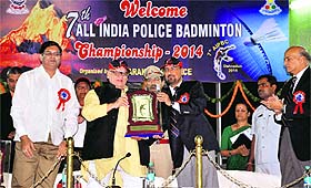 BS Sidhu, DIG, gives a memento to Governor Aziz Qureshi at the opening ceremony of the 7th All-India Police Badminton Championship in Dehradun on Wednesday. 