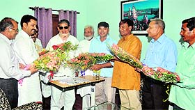 A delegation of Uttarakhand Cooperative Silk Federation meet Chief Minister Harish Rawat in Dehradun on Wednesday. 