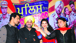 Bhagwant Mann and the star cast of Punjabi movie, Police in Pollywood during the films promotion in Amritsar on Thursday. Tribune photo