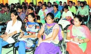 Students of Guru Kashi University attend a seminar on World Sight Day in Bathinda on Thursday