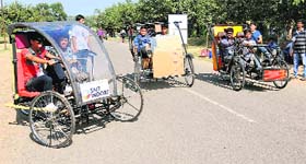 creative streak: Student teams test-ride their vehicles designed for the EFFI-cycle event, to be held at the University Institute of Engineering and Technology at the PU in Chandigarh, on Thursday.