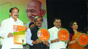 Union Minister of Urban Development Venkaiah Naidu, Delhi Pradesh BJP president Satish Upadhyay and former AAP leader Shazia Illmi (R) launch the Swachh Delhi Abhiyan in New Delhi on Thursday. 