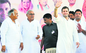 Congress vice-president Rahul Gandhi at a rally in Ganaur on Thursday. CM Bhupinder Singh Hooda, Ganaur candidate Kuldeep Sharma (extreme left) and HPCC chief Ashok Tanwar (extreme right) are also seen.