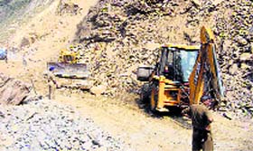 JCB machines clear the Gangru Ramsu stretch of the NH-44.