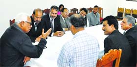 Governor NN Vohra with a delegation of the Kashmir Society at Raj Bhawan in Srinagar on Thursday.
