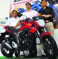 Company officials during the lauch of Suzuki Gixxer in Ludhiana on Thursday. Photo: Inderjeet Verma