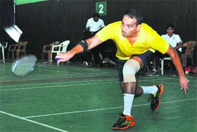 Raj Kumar of Uttar Pradesh returns a shot during the 7th All India Police Badminton Championship at Sports Complex in Dehradun on Thursday