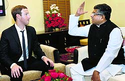 IT Minister Ravi Shankar Prasad interacts with Facebook CEO Mark Zuckerberg in New Delhi on Friday