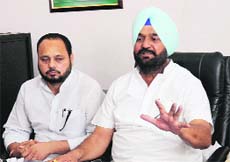 Former Congress MLA Harmander singh Jassi addresses a press conference in Bathinda on Friday.