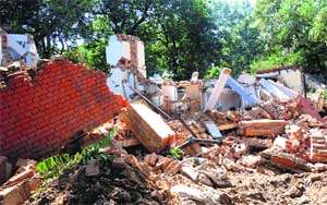 Debris lies scattered after a building in Sec 18 was razed to make way for a multi-storeyed building that will house offices of Punjab, Haryana and the UT