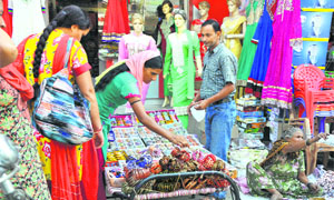Women shop for bangles on the eve of Karva Chauth in Samba district on Friday. 