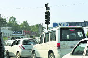 Non-functional traffic lights lead to a traffic jam in Jammu on Friday. 