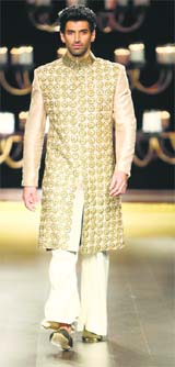 There is so much more than the traditional sherwani with churidaar for grooms. Manish Malhotra's plazzo-like-bottoms with sherwanis are an interesting alternate to churidaars