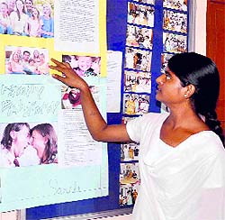 A student reads an awareness poster put up at Kanya Gurukul College in Haridwar on Friday. 