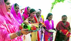 Women observe Karwa Chauth fast inside the Central Jail in Amritsar on Saturday