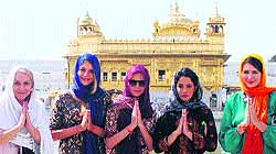 Ambassadors of NGO We for We (women empowerment), at the Golden Temple in Amritsar on Saturday