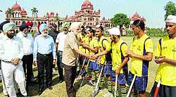 Khalsa College Governing Council (KCGC) President Satyajit Singh Majithia meets hockey players during the launch of Diwali tournament at the college in Amritsar on Saturday