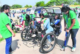A team gives the final touches to its vehicle at the UIET, Panjab University, in Chandigarh