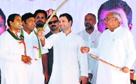 Congress vice-president Rahul Gandhi with CM Bhupinder Singh Hooda (right) and state Congress chief Ashok Tanwar (second from left) at Kalanwali in Sirsa on Saturday.