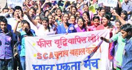 Students take out a rally against government policies in Mandi on Saturday.