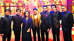 The team of Happy New Year on the show Comedy Nights With Kapil