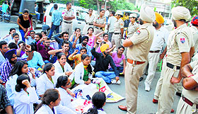 Chintpurni Medical College students protest near Medical Education Minister Anil Joshis residence in Amritsar on Saturday.