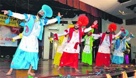 Students perform bhangra at the Zonal Youth Festival of affiliated colleges at Guru Nanak Dev University in Amritsar on Sunday.