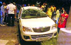 A car that was damaged after it turned turtle at the Sector 20/30 light point in Chandigarh late on Sunday evening. The occupants of the car had a providential escape