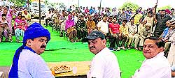 BSP candidate Satvinder Singh Rana (left) with party leaders at a public meeting in Tagra village near Kalka on Sunday