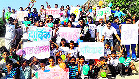 Rescued children and BBA volunteers celebrate the Nobel Prize for the organisations founder Kailash Satyarthi in Jalandhar on Sunday. 