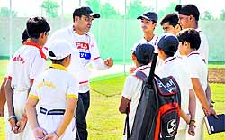 Virender Sehwag gives tips to budding cricketers at the Sehwag Cricket Academy