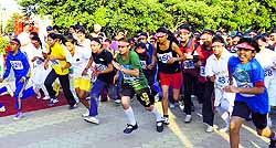 Schoolchildren participate in the Run for Unity organised by the CRPF at the Gulshan Ground in Jammu on Sunday